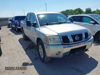 2007 Nissan Titan LE with VIN 1N6AA07B27N232926, listed as a IAAI auction lot 42667946 with 101,407 mi miles and . Bid and sale history available at DreamBid. Image 1.