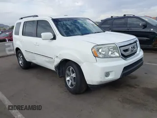 2009 Honda Pilot Touring z VIN 5FNYF48819B036104, wystawiony jako IAAI lot #42019099 z przebiegiem 135 792 mil mil oraz . Historia ofert i sprzedaży dostępna na DreamBid. Obrazek 1.