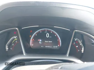 2019 Honda Civic Sport with VIN 2HGFC2F85KH576547, listed as a IAAI auction lot 42024497 with 86,468 mi miles and . Bid and sale history available at DreamBid. Image 7.