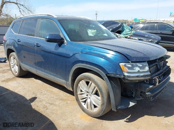 2019 Volkswagen Atlas 3.6L V6 SE w/Technology with VIN 1V2WR2CA9KC571695, listed as a IAAI auction lot 41895710 with 128,148 mi miles. Bid and sale history available at carsss.com. Image 1.