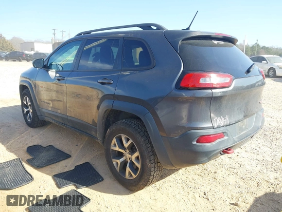 2014 Jeep Cherokee Trailhawk with VIN 1C4PJMBS6EW278987, listed as a IAAI auction lot 41789868 with 136,696 mi miles. Bid and sale history available at carsss.com. Image 3.