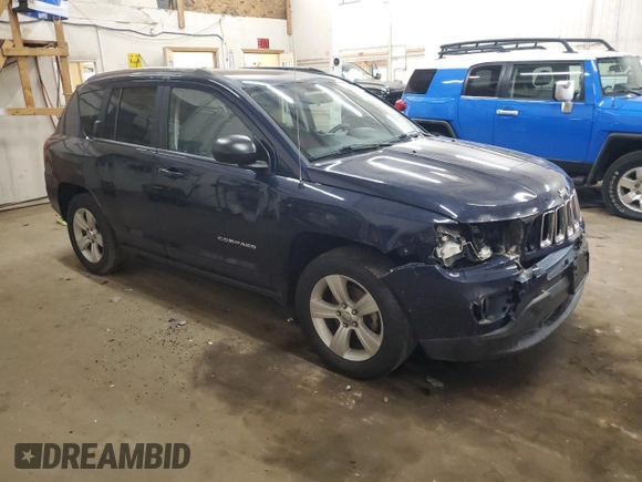 2014 Jeep Compass Sport with VIN 1C4NJDBB0ED598518, listed as a Copart auction lot 55072665 with 128,141 mi miles and Salvage Title. Bid and sale history available at carsss.com. Image 4.