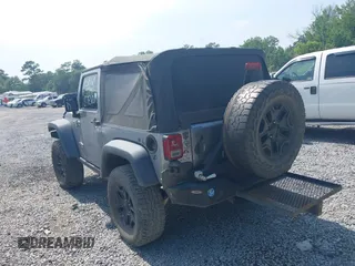2015 Jeep Wrangler Freedom Edition with VIN 1C4AJWAG4FL589769, listed as a IAAI auction lot 42704488 with 194,414 mi miles and . Bid and sale history available at DreamBid. Image 3.