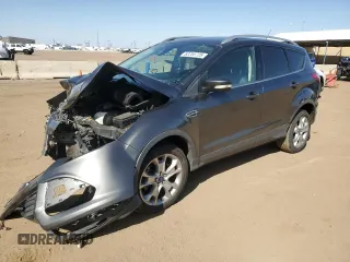 2016 Ford Escape Titanium with VIN 1FMCU9J96GUC63384, listed as a Copart auction lot 52255725 with 136,869 mi miles and Salvage Title. Bid and sale history available at carsss.com. Image 1.
