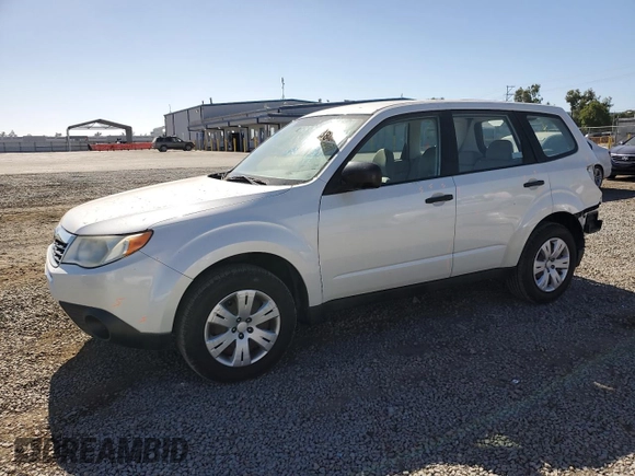 2010 Subaru Forester X with VIN JF2SH6AC0AH743775, listed as a Copart auction lot 60884835 with 127,481 mi miles and Salvage title. Bid and sale history available at DreamBid. Image 1.