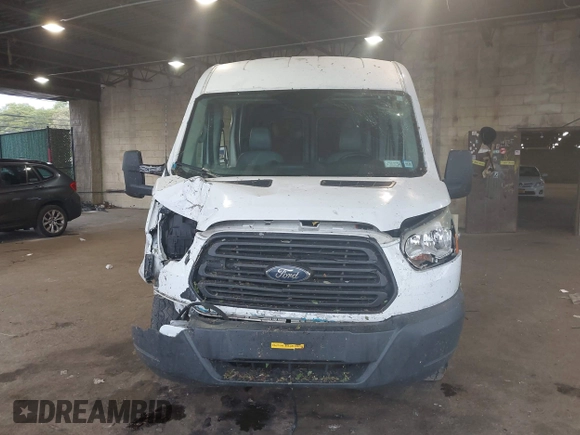 2015 Ford Transit Cargo z VIN 1FTNR2CM1FKA40154, wystawiony jako IAAI lot #42210986 z przebiegiem 164 324 mil mil oraz . Historia ofert i sprzedaży dostępna na DreamBid. Obrazek 12.