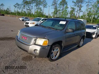 2008 GMC Envoy Denali with VIN 1GKES63M982258281, listed as a IAAI auction lot 42022548 with 265,129 mi miles. Bid and sale history available at carsss.com. Image 2.