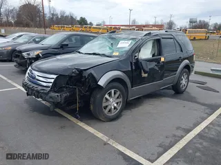 2008 Ford Taurus X SEL with VIN 1FMDK02W28GA45128, listed as a IAAI auction lot 41083496 with 177,171 mi miles. Bid and sale history available at carsss.com. Image 2.