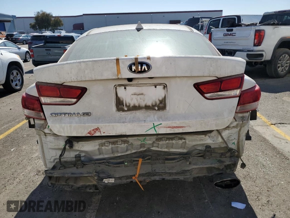 2019 Kia Optima LX with VIN 5XXGT4L36KG329998, listed as a Copart auction lot 74248564 with 123,941 mi miles and Salvage Title. Bid and sale history available at DreamBid. Image 6.