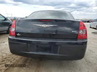 2009 Chrysler 300 LX z VIN 2C3KA43D79H556962, wystawiony jako Copart lot #58315205 z przebiegiem 177 577 mil mil oraz Szkoda całkowita • Salvage title. Historia ofert i sprzedaży dostępna na DreamBid. Obrazek 6.