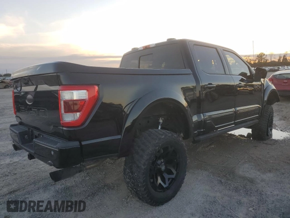 2021 Ford F-150 XL with VIN 1FTFW1E5XMFB70288, listed as a Copart auction lot 87917535 with 35,111 mi miles and Salvage Title. Bid and sale history available at carsss.com. Image 3.