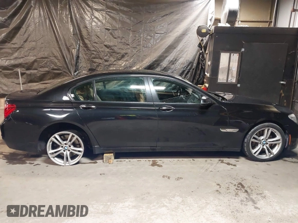 2014 BMW 7 Series ALPINA B7 xDrive with VIN WBAYF8C53ED141858, listed as a IAAI auction lot 40987098 with 128,404 mi miles and . Bid and sale history available at DreamBid. Image 13.