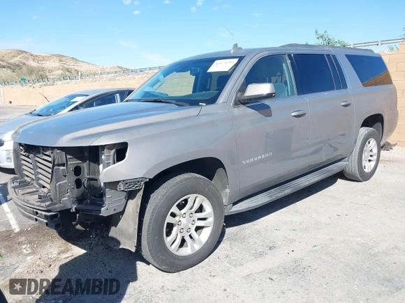 2017 Chevrolet Suburban LS with VIN 1GNSCGEC9HR355405, listed as a IAAI auction lot 41674594 with 170,312 mi miles and . Bid and sale history available at DreamBid. Image 2.