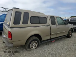 2000 Ford F-150 XL with VIN 1FTRX17L3YKB07018, listed as a Copart auction lot 66998714 with 0 mi miles and Salvage Title. Bid and sale history available at carsss.com. Image 3.