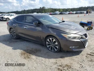 2016 Nissan Maxima SR z VIN 1N4AA6APXGC439401, wystawiony jako Copart lot #52011535 z przebiegiem 132 267 mil mil oraz Szkoda całkowita • Salvage title. Historia ofert i sprzedaży dostępna na DreamBid. Obrazek 4.