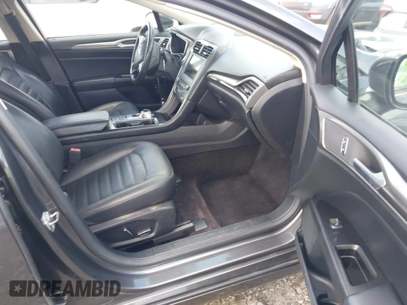 2017 Ford Fusion Hybrid SE z VIN 3FA6P0LU3HR260558, wystawiony jako IAAI lot #42657176 z przebiegiem 161 183 mil mil oraz . Historia ofert i sprzedaży dostępna na DreamBid. Obrazek 5.