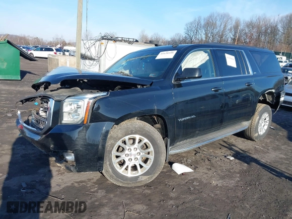 2015 GMC Yukon XL SLT with VIN 1GKS2HKC8FR154330, listed as a IAAI auction lot 41650106 with 268,056 mi miles. Bid and sale history available at carsss.com. Image 2.