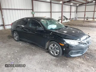 2017 Honda Civic LX with VIN 19XFC2F5XHE002003, listed as a IAAI auction lot 42169630 with 112,394 mi miles and . Bid and sale history available at DreamBid. Image 1.