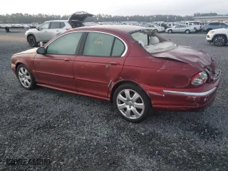 2004 Jaguar X-Type with VIN SAJEA51C54WD60087, listed as a Copart auction lot 77611854 with 0 mi miles and Salvage Title. Bid and sale history available at carsss.com. Image 2.