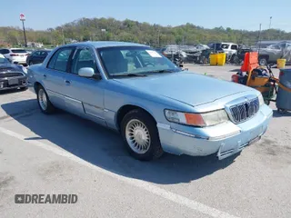 2001 Mercury Grand Marquis LS with VIN 2MEFM75W61X676829, listed as a IAAI auction lot 42037945 with 134,126 mi miles and . Bid and sale history available at DreamBid. Image 1.