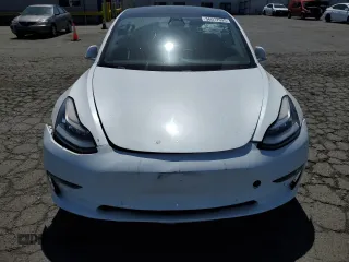 2019 Tesla Model 3 Mid Range with VIN 5YJ3E1EA3KF425125, listed as a Copart auction lot 56072995 with 105,345 mi miles and Salvage Title. Bid and sale history available at DreamBid. Image 5.