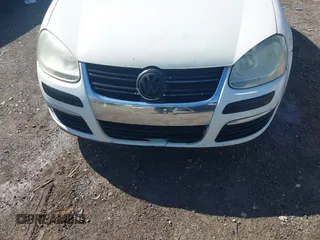 2008 Volkswagen Jetta Sedan S with VIN 3VWJZ71K68M119423, listed as a IAAI auction lot 41942134 with 233,783 mi miles. Bid and sale history available at carsss.com. Image 6.