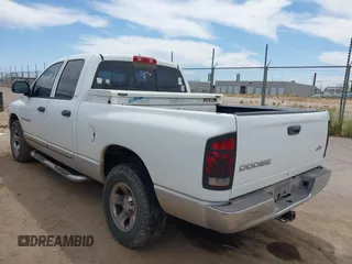 2002 Dodge 1500 with VIN 1D7HU18Z82S576903, listed as a IAAI auction lot 42125464 with 215,479 mi miles. Bid and sale history available at carsss.com. Image 3.