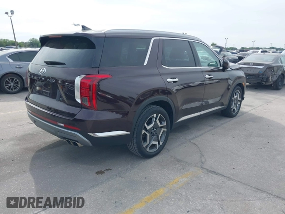 2023 Hyundai Palisade Limited z VIN KM8R54GE0PU517573, wystawiony jako IAAI lot #41870400 z przebiegiem 11 477 mil mil oraz . Historia ofert i sprzedaży dostępna na DreamBid. Obrazek 4.