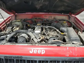 1996 Jeep Cherokee Sport with VIN 1J4FJ68S6TL213886, listed as a Copart auction lot 51462275 with 215,091 mi miles and Salvage title. Bid and sale history available at DreamBid. Image 13.