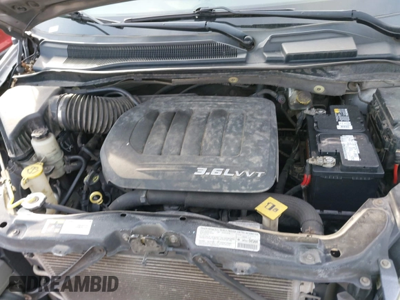 2013 Dodge Grand Caravan SXT with VIN 2C4RDGCG8DR551723, listed as a IAAI auction lot 41510574 with 183,432 mi miles and . Bid and sale history available at DreamBid. Image 10.
