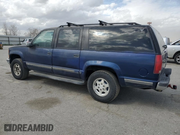 1997 Chevrolet Suburban z VIN 1GNFK16R9VJ309720, wystawiony jako Copart lot #48814475 z przebiegiem 198 109 mil mil oraz Czysty tytuł • Clean title. Historia ofert i sprzedaży dostępna na DreamBid. Obrazek 2.