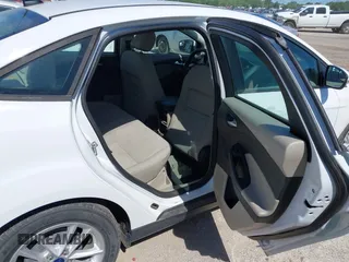 2015 Ford Focus SE with VIN 1FADP3F26FL289857, listed as a IAAI auction lot 42206474 with 111,287 mi miles and . Bid and sale history available at DreamBid. Image 8.