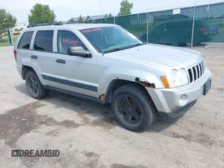 2005 Jeep Grand Cherokee Laredo with VIN 1J4HR48N35C514392, listed as a IAAI auction lot 42453535 with 174,523 mi miles and . Bid and sale history available at DreamBid. Image 1.