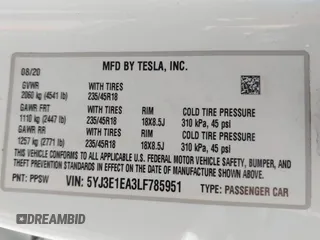 2020 Tesla Model 3 Standard Range Plus with VIN 5YJ3E1EA3LF785951, listed as a IAAI auction lot 41919339 with 63,025 mi miles and . Bid and sale history available at carsss.com. Image 9.