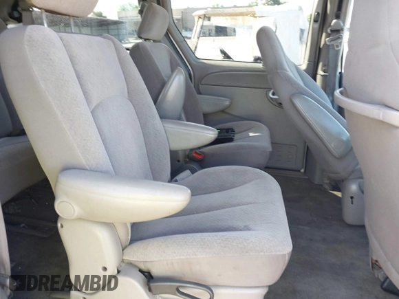 2003 Dodge Caravan Sport with VIN 2D4GP44R73R279132, listed as a IAAI auction lot 42100140 with 218,201 mi miles and . Bid and sale history available at carsss.com. Image 8.