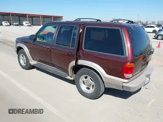 1999 Ford Explorer XLT z VIN 1FMZU35P9XZB88909, wystawiony jako IAAI lot #41759221 z przebiegiem 238 840 mil mil oraz . Historia ofert i sprzedaży dostępna na DreamBid. Obrazek 3.