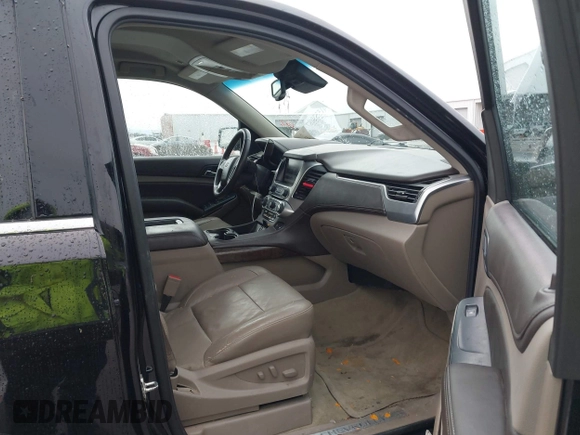 2015 Chevrolet Tahoe LT with VIN 1GNSCBKC2FR632139, listed as a IAAI auction lot 41553087 with 142,775 mi miles and . Bid and sale history available at DreamBid. Image 5.