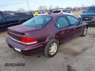 1998 Chrysler Cirrus LXi z VIN 1C3EJ56H4WN103676, wystawiony jako IAAI lot #41554781 z przebiegiem 131 923 mil mil oraz . Historia ofert i sprzedaży dostępna na DreamBid. Obrazek 4.