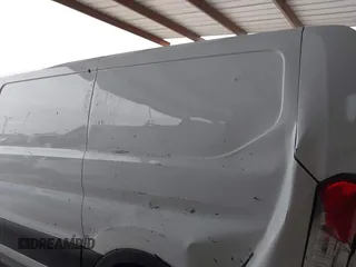 2019 Ford Transit with VIN 1FTYE1ZM2KKB46391, listed as a IAAI auction lot 41362328 with 128,327 mi miles and . Bid and sale history available at carsss.com. Image 18.