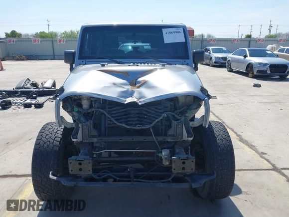 2014 Jeep Wrangler Sport with VIN 1C4AJWAG9EL155409, listed as a IAAI auction lot 41869906 with 102,400 mi miles and . Bid and sale history available at carsss.com. Image 13.