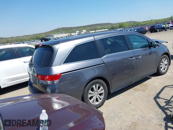 2016 Honda Odyssey SE with VIN 5FNRL5H33GB125693, listed as a IAAI auction lot 41994036 with 163,617 mi miles and . Bid and sale history available at DreamBid. Image 4.
