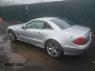 2005 Mercedes-Benz SL 500 with VIN WDBSK75F05F094991, listed as a Copart auction lot 61678705 with 128,123 mi miles and Clean title. Bid and sale history available at DreamBid. Image 2.