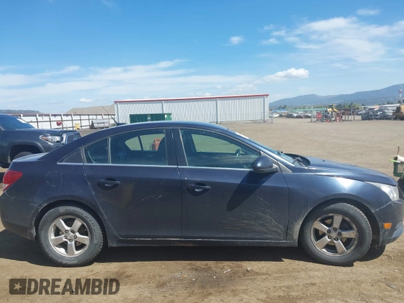 2014 Chevrolet Cruze 1LT with VIN 1G1PC5SB9E7114104, listed as a IAAI auction lot 42143300 with 161,552 mi miles and . Bid and sale history available at DreamBid. Image 13.