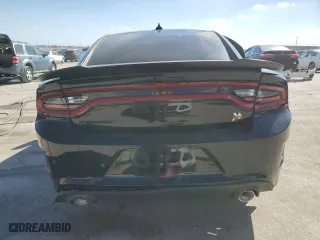 2022 Dodge Charger Scat Pack with VIN 2C3CDXGJXNH180037, listed as a Copart auction lot 77573324 with 15,583 mi miles and Salvage Title. Bid and sale history available at carsss.com. Image 6.