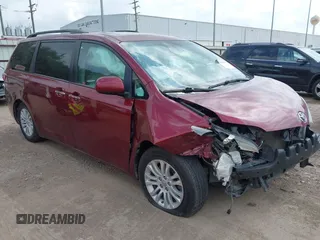 2016 Toyota Sienna XLE z VIN 5TDYK3DC2GS721334, wystawiony jako IAAI lot #42161901 z przebiegiem 92 423 mil mil oraz . Historia ofert i sprzedaży dostępna na DreamBid. Obrazek 1.