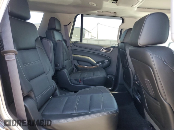 2015 GMC Yukon Denali with VIN 1GKS2CKJ5FR612147, listed as a Copart auction lot 49209525 with 127,262 mi miles and Salvage Title. Bid and sale history available at carsss.com. Image 11.