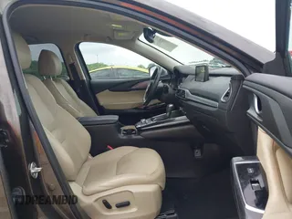 2017 Mazda CX-9 Touring z VIN JM3TCACY7H0129335, wystawiony jako IAAI lot #42289926 z przebiegiem 60 425 mil mil oraz . Historia ofert i sprzedaży dostępna na DreamBid. Obrazek 5.