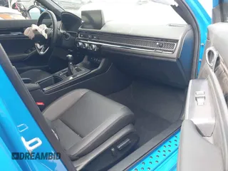 2024 Honda Civic Sport Touring z VIN 19XFL1G86RE029798, wystawiony jako IAAI lot #41469492 z przebiegiem 13 104 mil mil oraz . Historia ofert i sprzedaży dostępna na DreamBid. Obrazek 5.