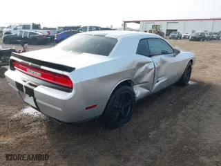 2012 Dodge Challenger SXT Plus with VIN 2C3CDYAG9CH104972, listed as a IAAI auction lot 41738042 with 148,794 mi miles. Bid and sale history available at carsss.com. Image 4.