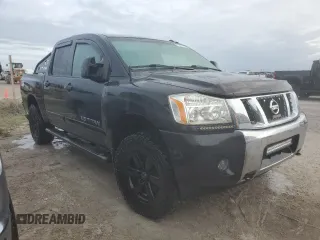 2013 Nissan Titan S with VIN 1N6AA0EC1DN302813, listed as a Copart auction lot 76369234 with 103,304 mi miles and Salvage Title. Bid and sale history available at DreamBid. Image 4.
